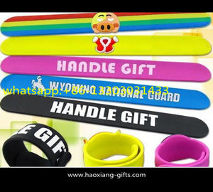 wholesale custom logo silicone pink color promotional reflective slap wristband