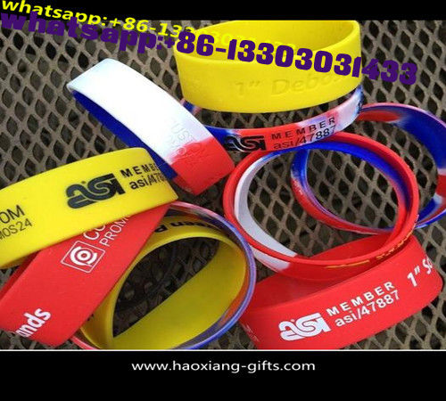cheap promotional silicone wristband with embossed colourful logo