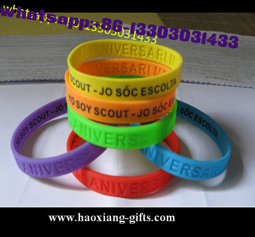 embossed/debossed/printed Silicone wristband color infilled in customer's design